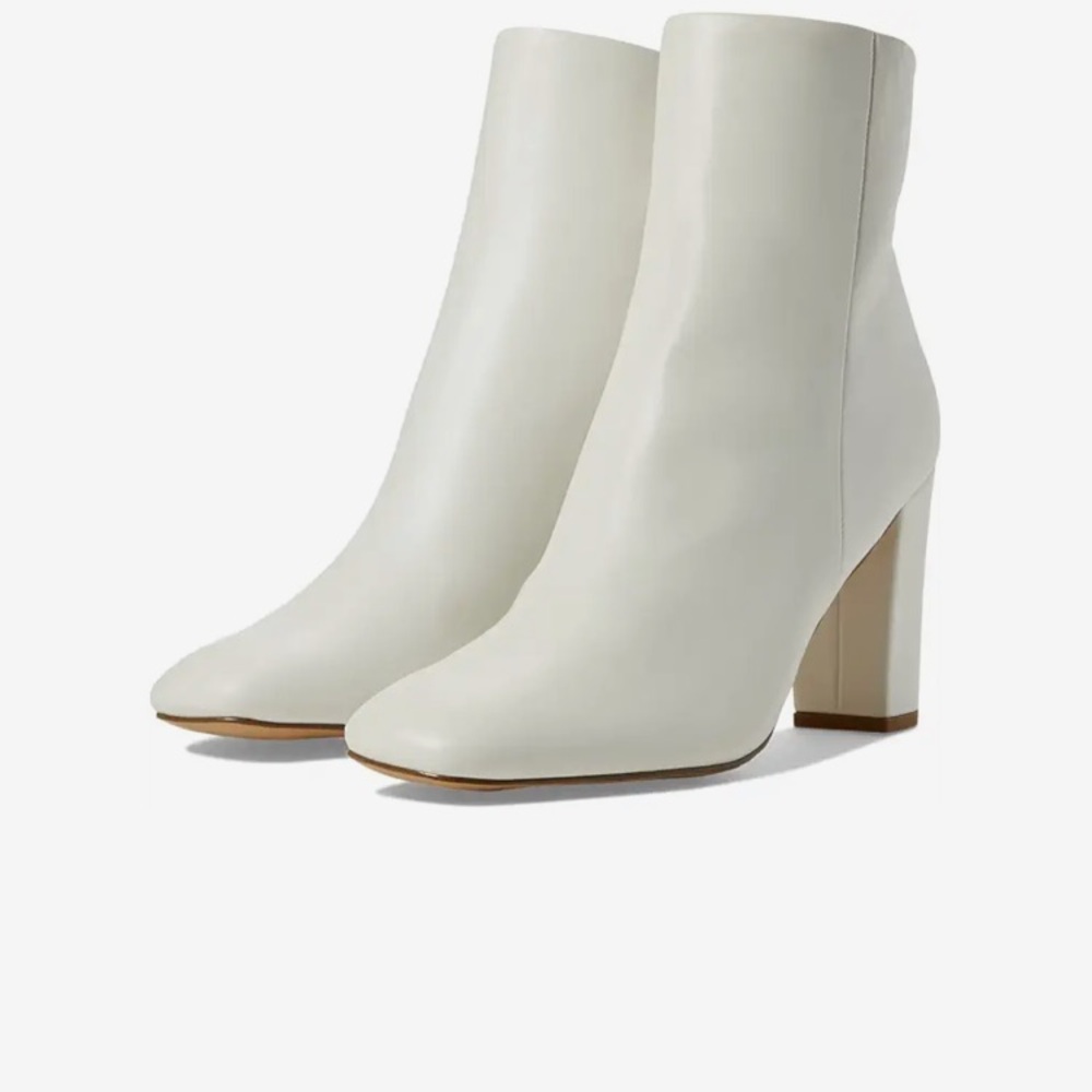 BRAND NEW cute white boots just in time for fall!